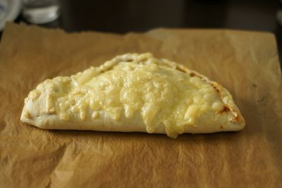 Baked calzone with cheese
