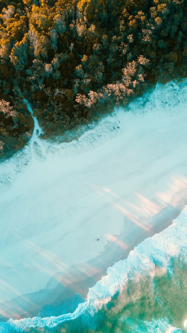 HIGH ANGLE VIEW OF SWIMMING POOL AT SEA