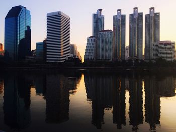 Buildings in city at dusk