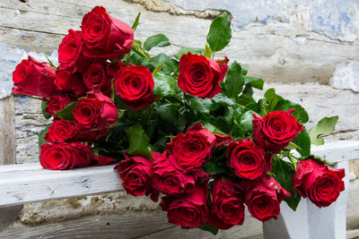 High angle view of red roses on table