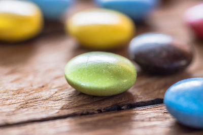 Close-up of multi colored balls on table