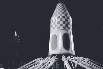 Low angle view of illuminated building at night