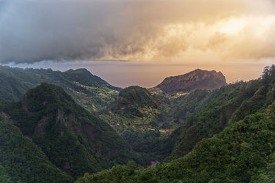 Scenic view of mountains against sky during sunset