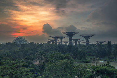 View of bridge against cloudy sky during sunset