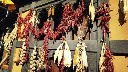 Close-up of vegetables hanging on market stall