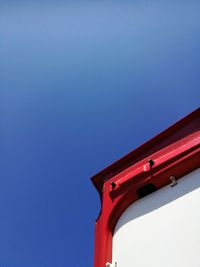Low angle view of built structure against blue sky