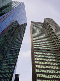 Low angle view of modern buildings against sky