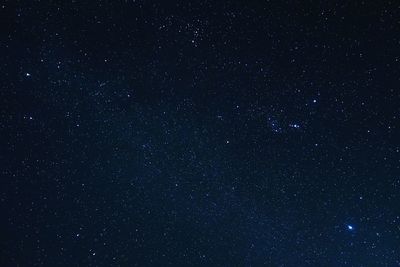Low angle view of stars in sky at night