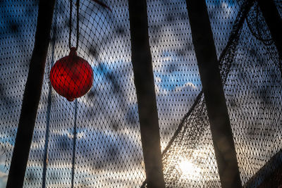 Low angle view of illuminated lanterns hanging on ceiling