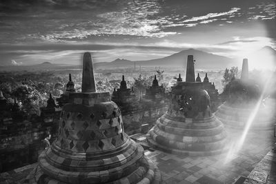 Stupas with mountain in background