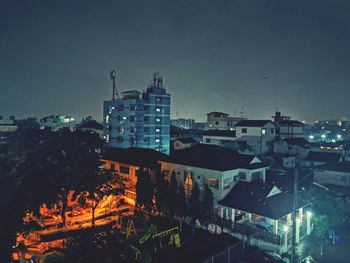 High angle view of illuminated buildings at night