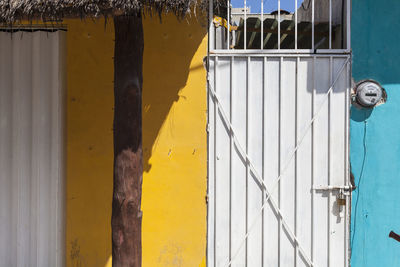 Close-up of yellow door