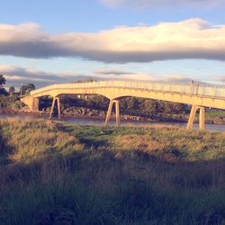 Bridge over landscape against sky