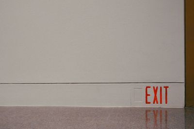 Exit sign on wall of museum