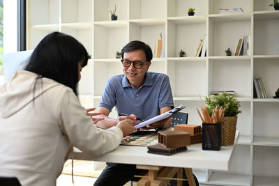 Business colleagues working in office