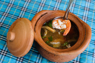 High angle view of soup in bowl on table