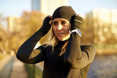 Outdoor portrait of an athletic woman.