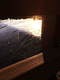 Close-up of sea during sunset