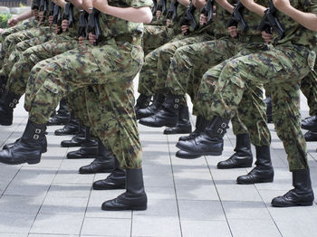 Low section of soldiers marching on street