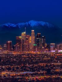 Illuminated buildings in city at night