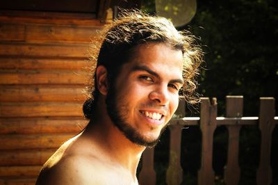 Portrait of young man standing outdoors