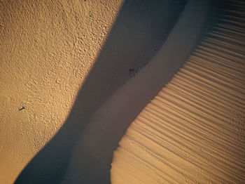 High angle view of shadow on desert