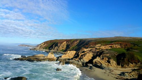 Vastness. headland cliffs. ocean turquoise waters. vanishing point.