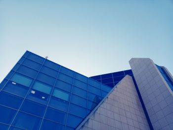 Low angle view of modern building against clear sky