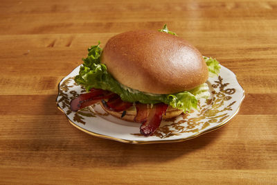 Close-up of burger in plate on table