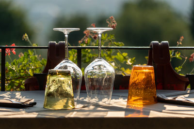 Close-up of glass bottles on table