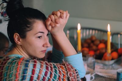 Woman sitting at dining table