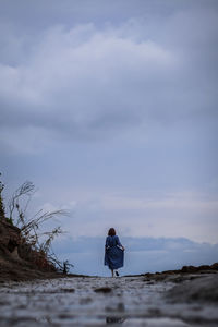 Man standing on rock