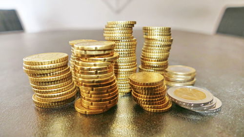 Close-up of coins on table