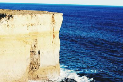 Scenic view of sea against blue sky