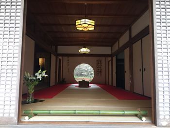 Illuminated corridor of building