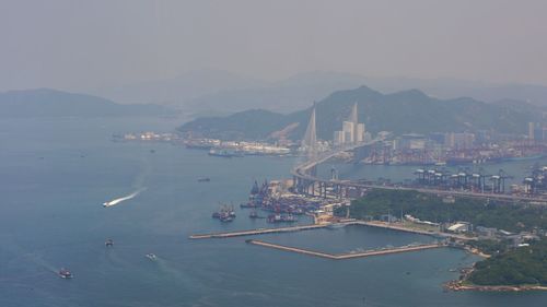 High angle view of boats in city