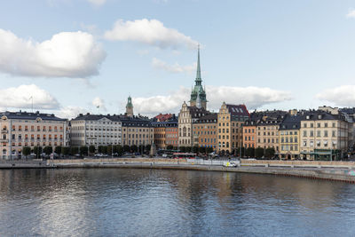 Buildings in city against sky
