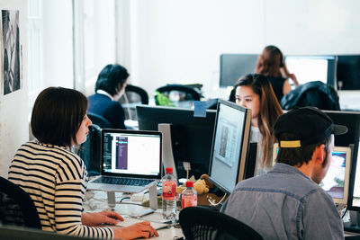 People working on computers at office