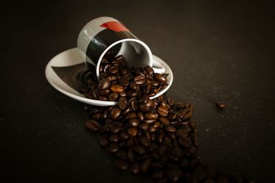 Close-up of coffee beans on table