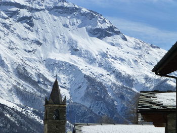 Scenic view of snow mountains against sky