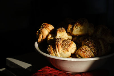 Close-up of food on table against black background