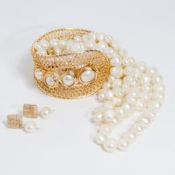 Close-up of wedding rings on white background