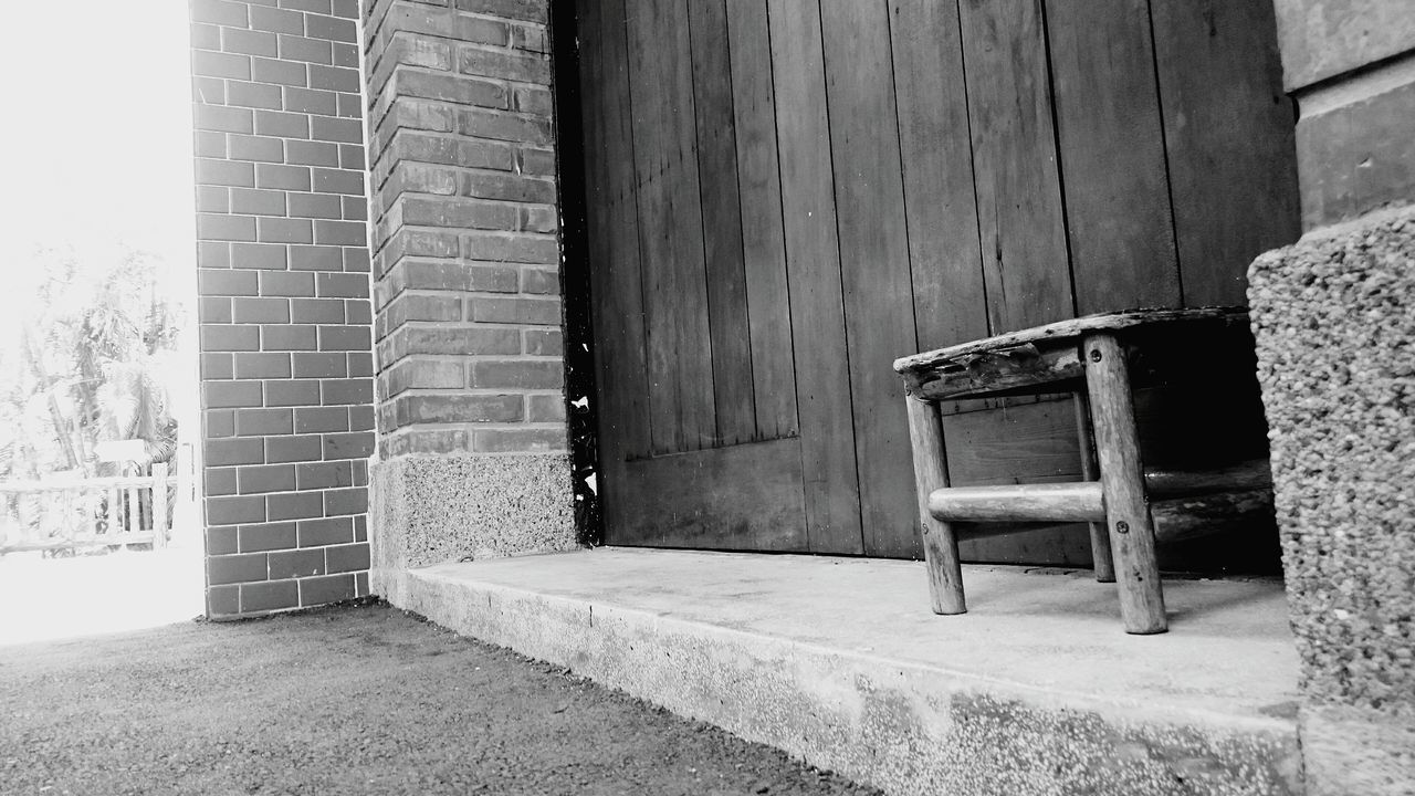 architecture, built structure, building exterior, door, wall - building feature, old, house, wall, window, closed, wood - material, absence, entrance, day, sunlight, no people, brick wall, empty, indoors, doorway