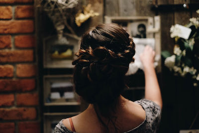 Rear view of woman with hairstyle