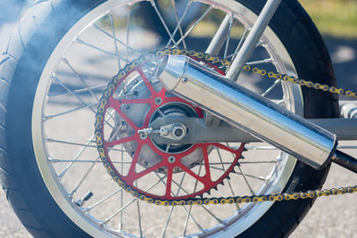 Close-up of motorcycle on street