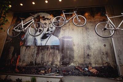 Bicycles hanging on wall