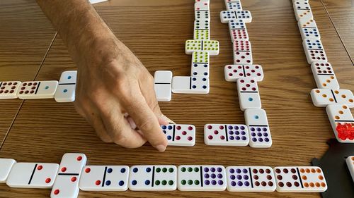 High angle view of man playing on table