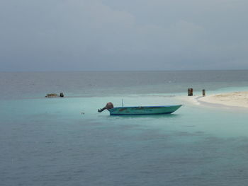 Scenic view of seascape against cloudy sky