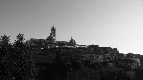 View of buildings against clear sky