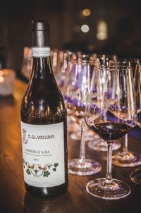 Close-up of wine glasses on table